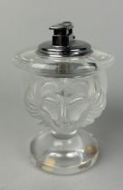 A LALIQUE FROSTED GLASS TABLE LIGHTER WITH FROSTED GLASS LIONS HEADS, Chip to one side of base. 12cm