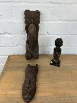 THREE AFRICAN TRIBAL WOODEN ITEMS (3) To include a figure, phallic shaped plaque and another. Figure