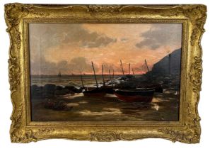 AN OIL ON CANVAS PAINTING DEPICTING BOATS BESIDES THE SEA, 44cm x 29cm Mounted in a gilt frame.
