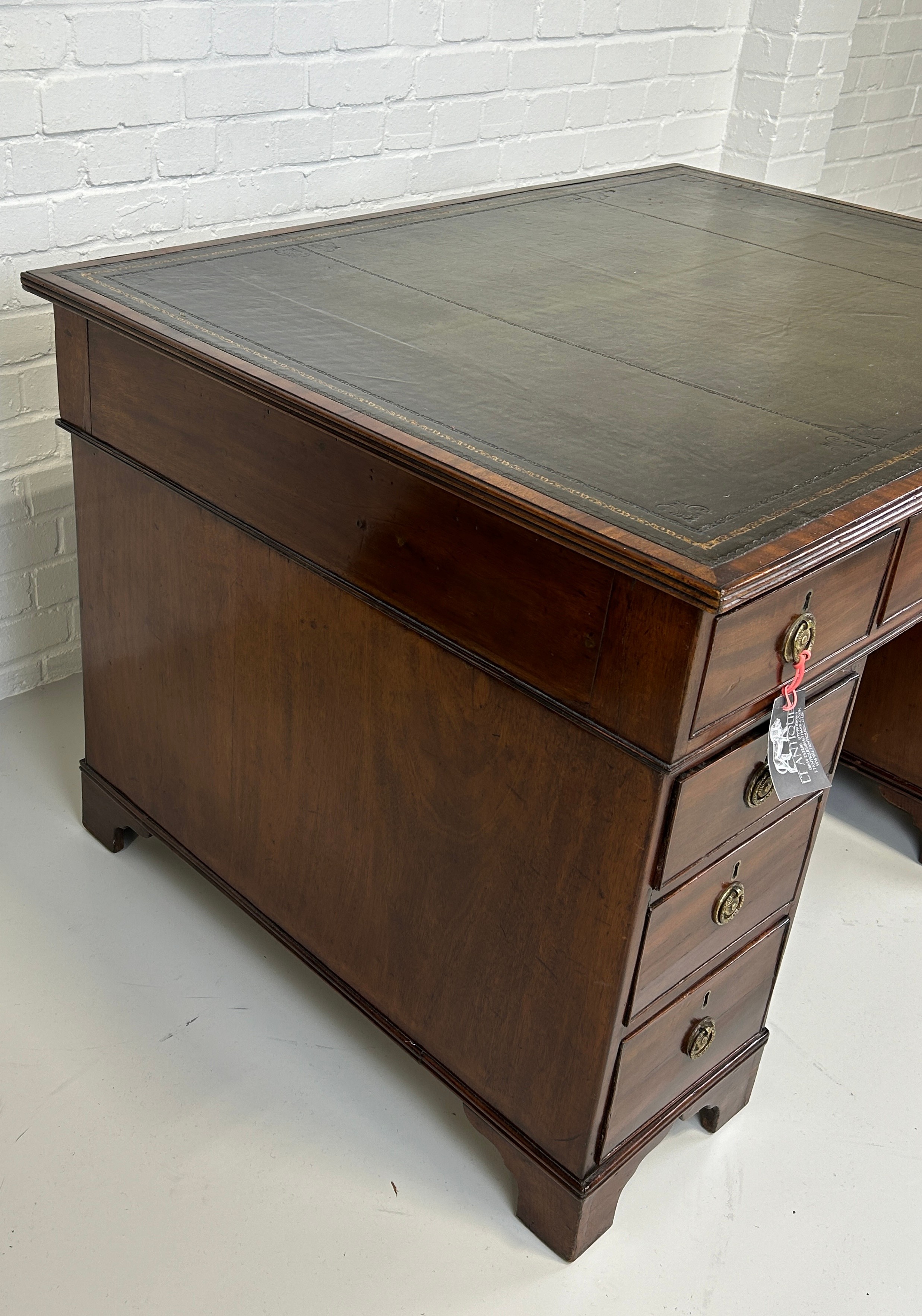 AN EARLY 19TH CENTRAL PARTNERS DESK, Two pedestals, each with ten drawers with brass handles. - Image 4 of 12