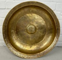 A LARGE OTTOMAN HAMMAM BASIN, Hand raised Tombak, metal inscribed with fish and symbols. 46cm x 9cm