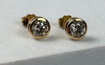 A PAIR OF DIAMOND STUD EARRINGS, Weight 1.37gms