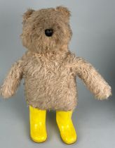 A VINTAGE BEAR POSSIBLY GERMAN IN YELLOW BOOTS 45cm x 42cm