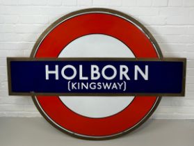 A LARGE LONDON UNDERGROUND RAILWAY SIGN FOR HOLBORN (KINGSWAY), With wooden board backing.