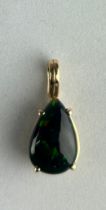 A BLACK OPAL CIRCA 5CT IN YELLOW GOLD PENDANT, Weight 1.8gms Opal 1.4cm x 0.9cm