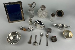 A MIXED COLLECTION OF SILVER TO INCLUDE: SPOONS, SALT SHAKERS, CUPS, CRUET, PICTURE FRAMES & MORE.