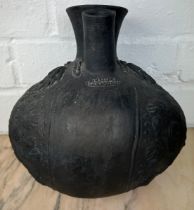 A PRE COLUMBIAN CHIMU BLACK WARE VESSEL, 20cm x 18cm