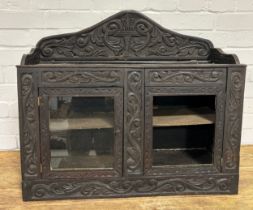 A CHARLES II DESIGN CARVED OAK CABINET, One glass missing, some damage 71cm x 44cm x 24cm