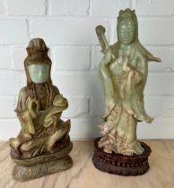 TWO LARGE CHINESE JADE FIGURES OF THE GUANYIN, One on wooden stand. Probably 20th century, or