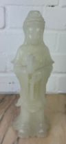 A CHINESE WHITE JADE FIGURE OF A GUANYIN, Probably 20th century or modern. 27cm H