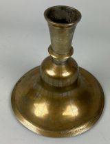 AN ISLAMIC BRASS CANDLESTICK, 20cm x 20cm