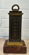 AN EARLY 19TH CENTURY FRENCH BRONZE AND GILT BRONZE CARD HOLDER ON ROUGE MARBLE BASE, French