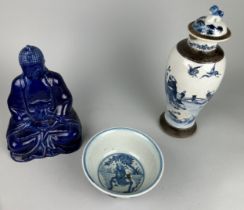 CHINESE CERAMICS: A BLUE AND WHITE BOWL, SEATED FIGURE OF A BUDDHA, BLUE AND WHITE VASE AND COVER (