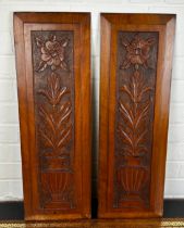 A PAIR OF DECORATIVE WOODEN PANELS WITH CARVED URNS AND FLOWERS (2), 67cm x 22cm