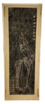 A LARGE CHINESE PRINT DEPICTING A FIGURE WITH CALLIGRAPHY, 112cm x 42cm The sheet laid on cardboard.