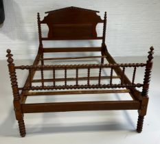 A LARGE 19TH CENTURY MAHOGANY TURNED BED,