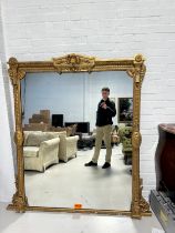 A LARGE FRENCH GILT WOOD MIRROR, 168cm x 140cm