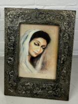 AN ARTS AND CRAFTS STYLE SILVER PICTURE FRAME, Print of lady within. 40cm x 29cm