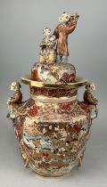 A LARGE 19TH CENTURY JAPANESE SATSUMA VASE AND COVER, Handles and finials formed as children. 58cm x