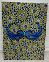 A PERSIAN TILE DECORATED WITH BIRDS AND FLOWERS, 49cm x 34cm