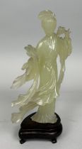 A 20TH CENTURY CHINESE JADEITE FIGURE OF A GUANYIN ON STAND, 18cm H