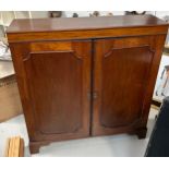 A MAHOGANY CUPBOARD OF SHALLOW PROPORTIONS WITH TWO SWING DOORS, 109cm x 100cm x 27cm