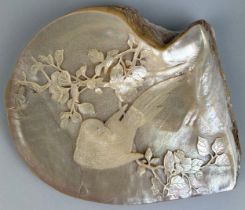A CHINESE MOTHER OF PEARL CARVING WITH A BIRD, 20cm x 18cm