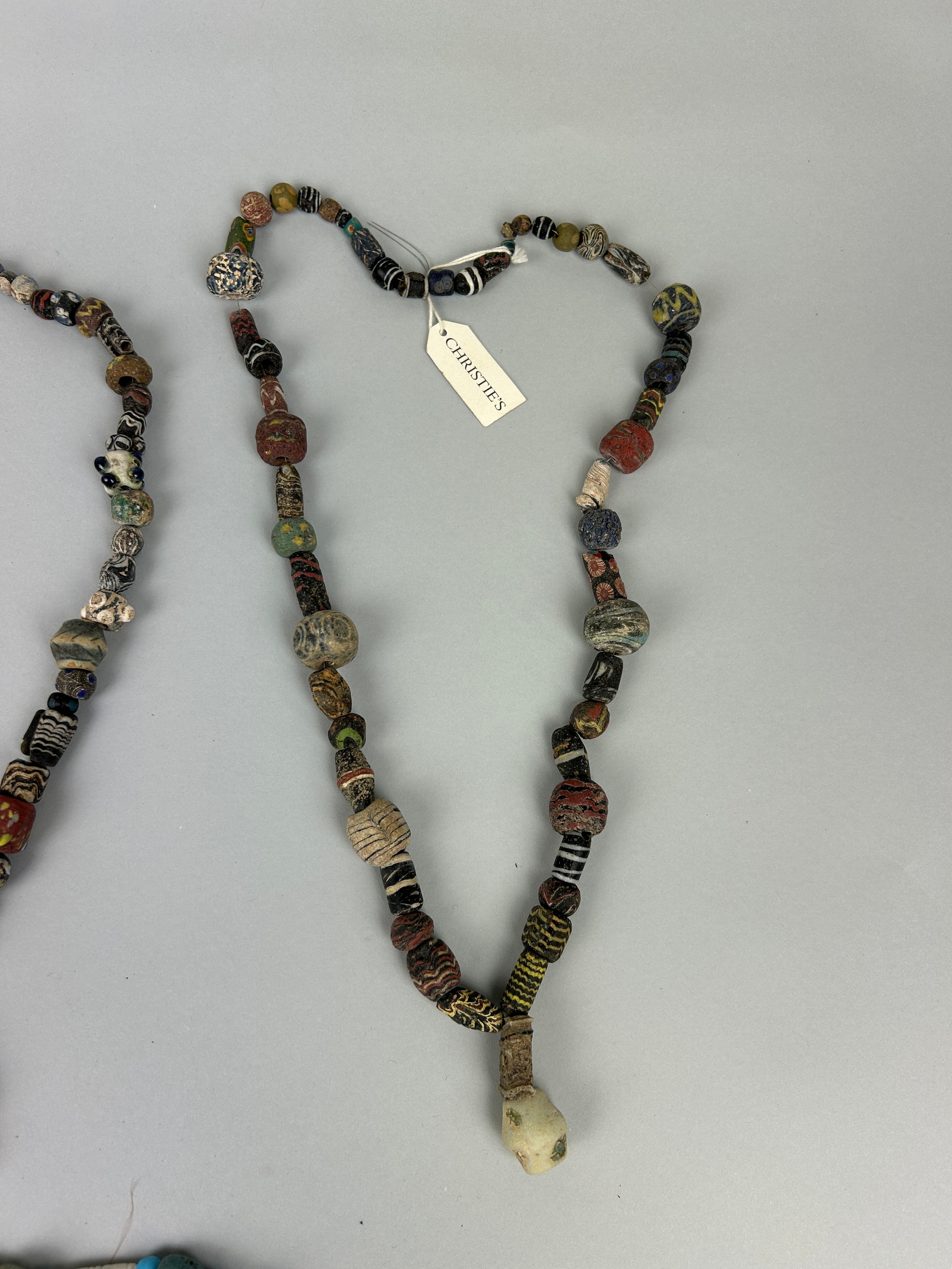A GROUP OF FOUR POLYCHROME MOSAIC GLASS BEAD NECKLACES, HELLENISTIC TO ISLAMIC PERIOD CIRCA 4TH - Image 2 of 14