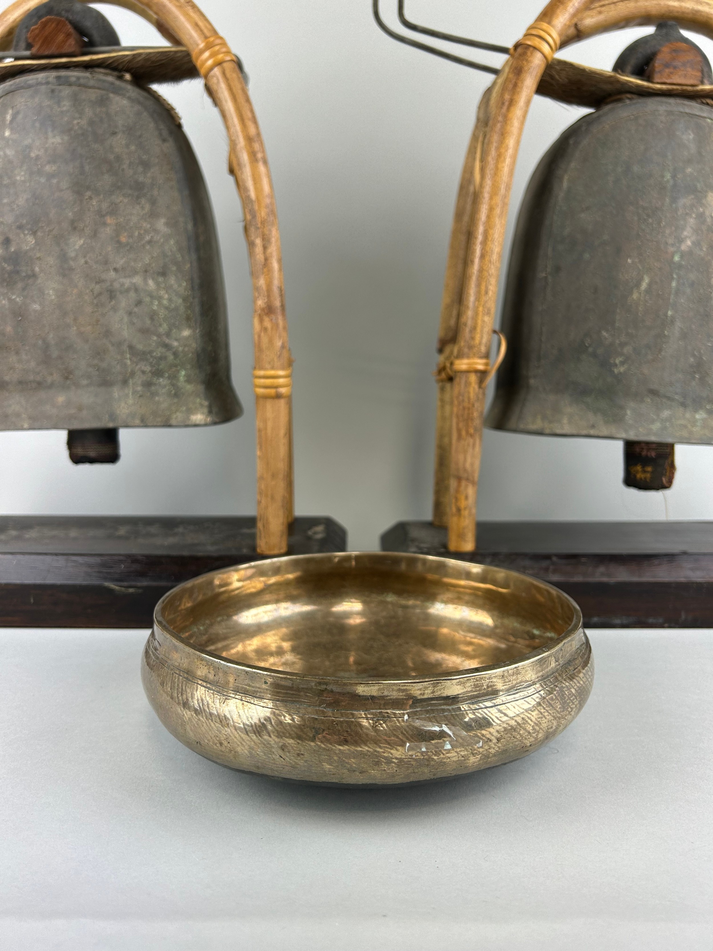 A PAIR OF BUDDHIST BRONZE ELEPHANT BELLS OR GONGS AND A SINGING BOWL (3), Each gong 43cm x 38cm - Image 3 of 5