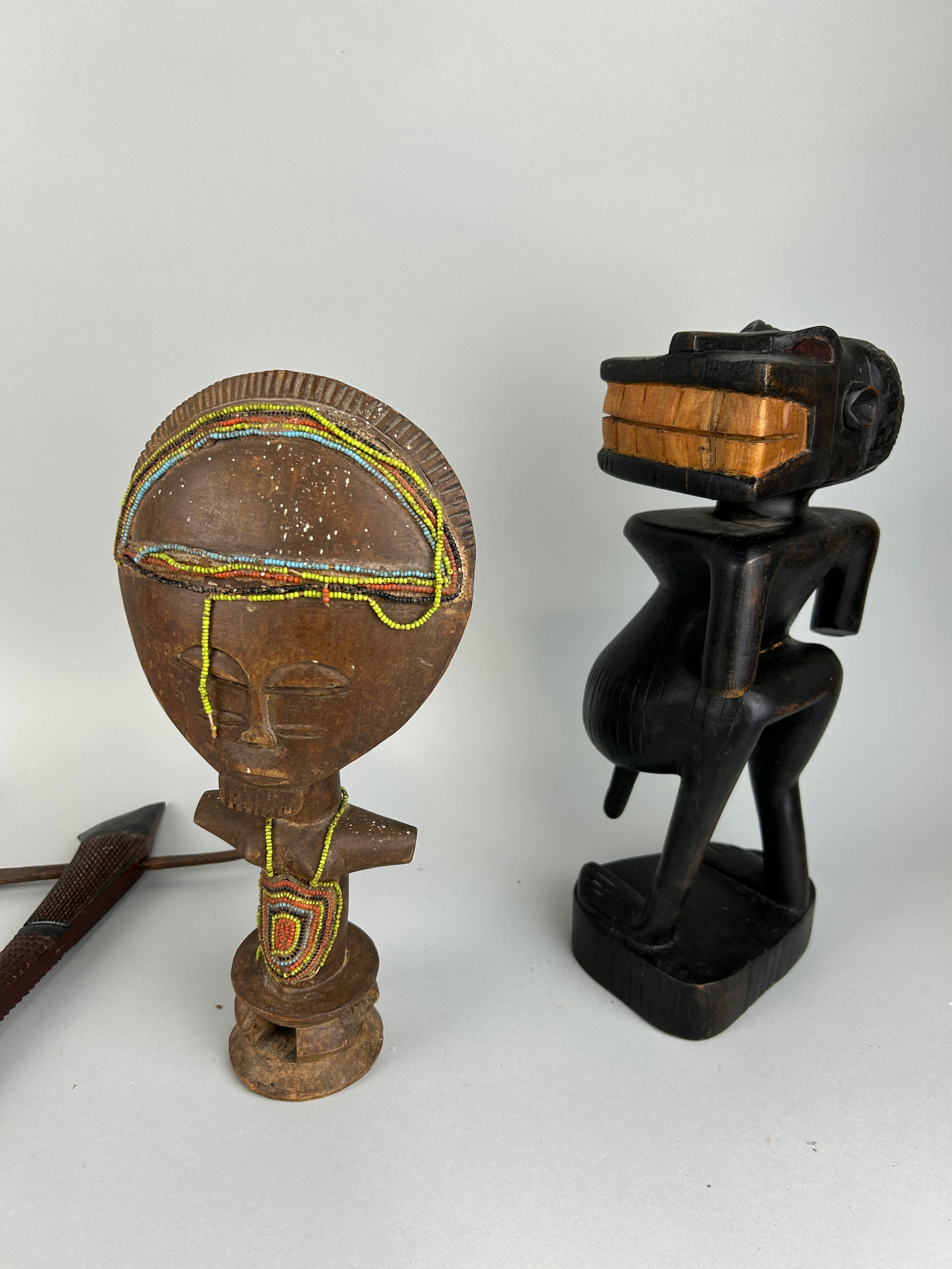 A COLLECTION OF AFRICAN ITEMS (4) To include two wooden figures and two axes Axes 60cm L Tallest - Image 3 of 4