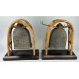 A PAIR OF BUDDHIST BRONZE ELEPHANT BELLS OR GONGS AND A SINGING BOWL (3), Each gong 43cm x 38cm