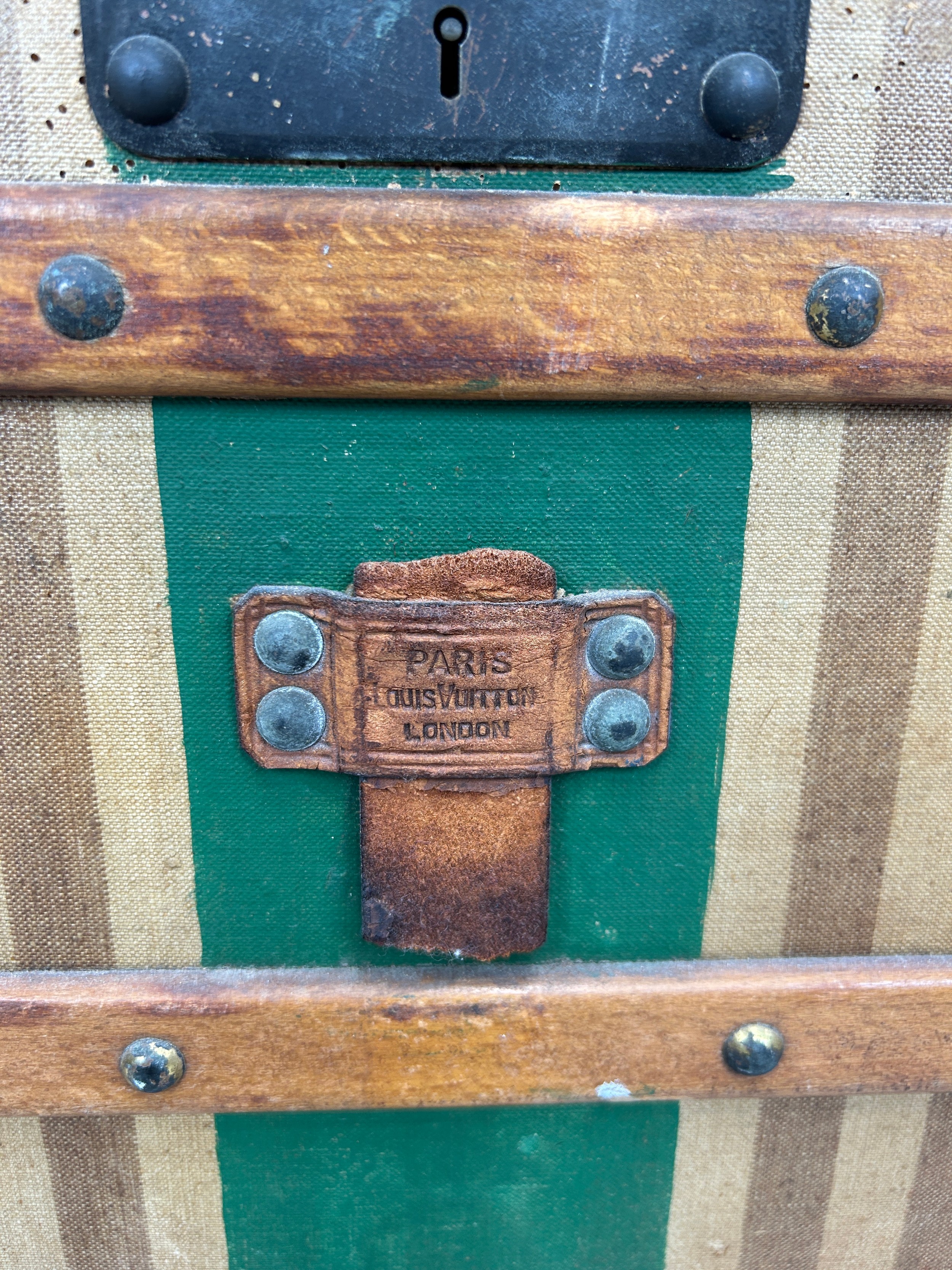 A 19TH CENTURY LOUIS VUITTON TRUNK CIRCA 1885, Brown striped design with leather details and green - Image 12 of 19