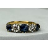 AN 18CT GOLD DIAMOND AND SAPPHIRE RING CIRCA 1907,