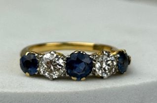 AN 18CT GOLD DIAMOND AND SAPPHIRE RING CIRCA 1907,