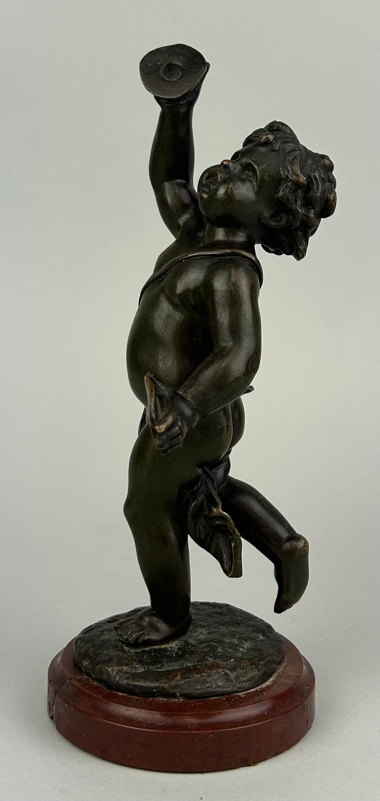 A 19TH CENTURY FRENCH BRONZE SCULPTURE OF A PUTTI AFTER CLAUDE CLODION (1738-1814) ON A RED MARBLE - Image 2 of 5