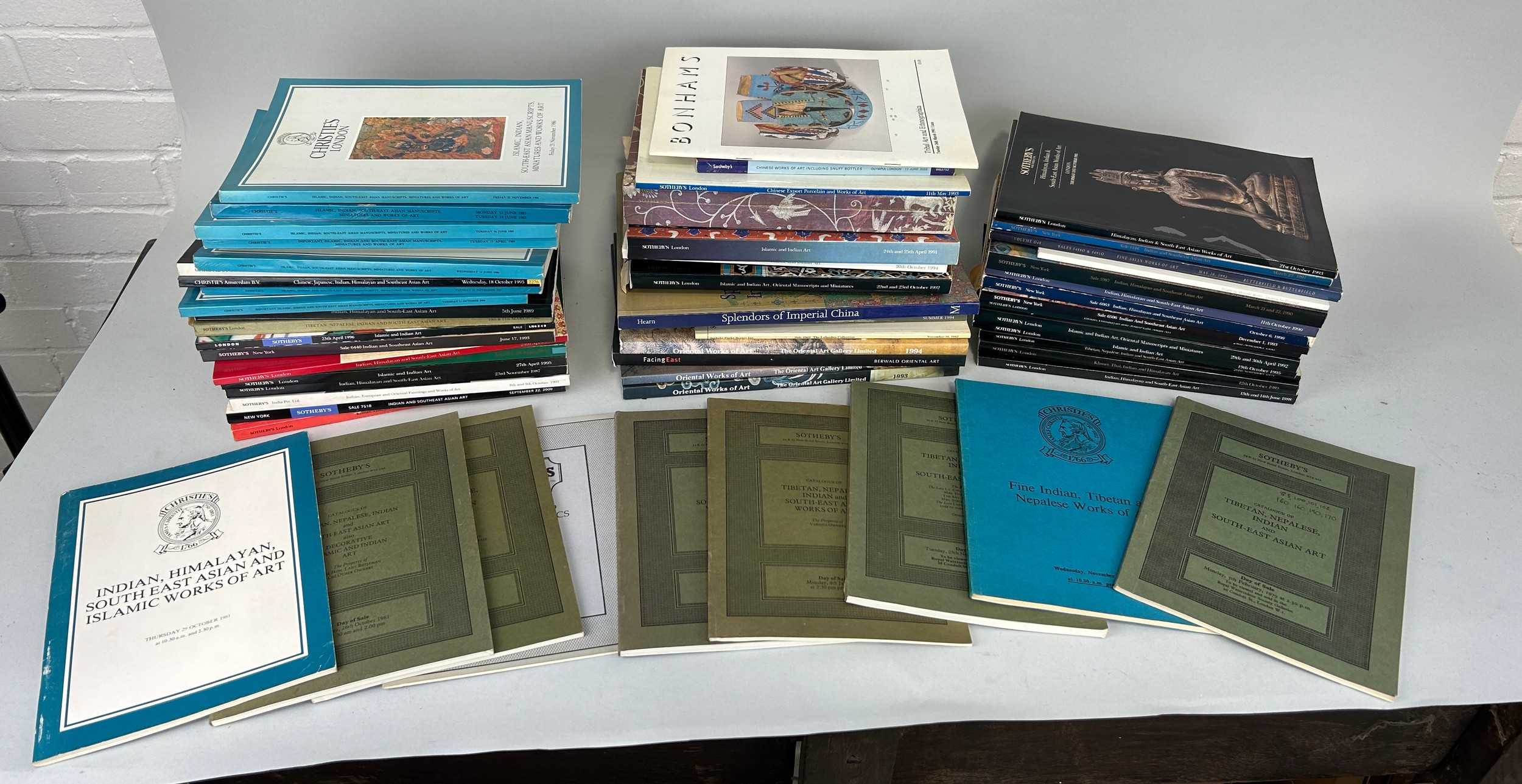 A LARGE COLLECTION OF ASIAN ART CATALOGUES FROM SOTHEBY'S, CHRISTIES, SPINK AND OTHER AUCTION HOUSES