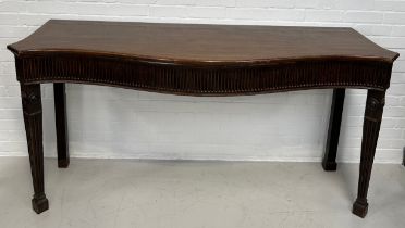 A 19TH CENTURY ROBERT ADAM STYLE MAHOGANY SERPENTINE SIDEBOARD, 183cm x 87cm x 60cm Provenance: