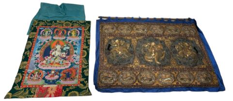 A TIBETAN THANGKA ALONG WITH AN EMBROIDERED WALL HANGING (2) Largest 128cm x 97cm