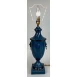 A CLASSICAL DESIGN SIMULATED BLUE MARBLE TABLE LAMP, With lion head handles.