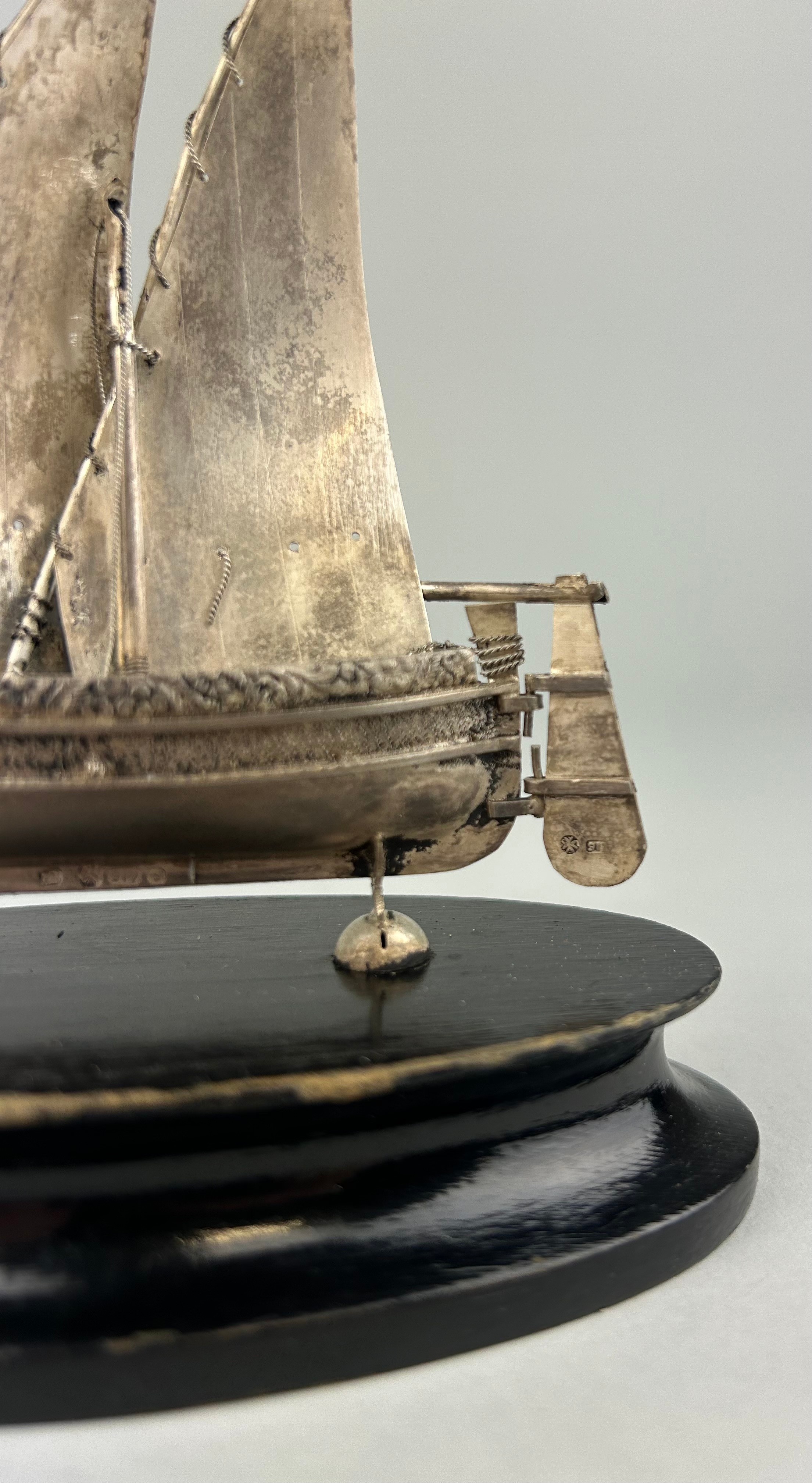 A SILVER JUNK SHIP MOUNTED ON STAND, 12cm x 12cm including stand. - Image 3 of 3