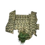 A SET OF UPHOLSTERED GREEN FLORAL CUSHIONS AND TASSLES (QTY)