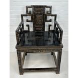 AN EARLY 20TH CENTURY CHINESE BLACK LACQUERED ARMCHAIR, 102cm x 65cm x 50cm