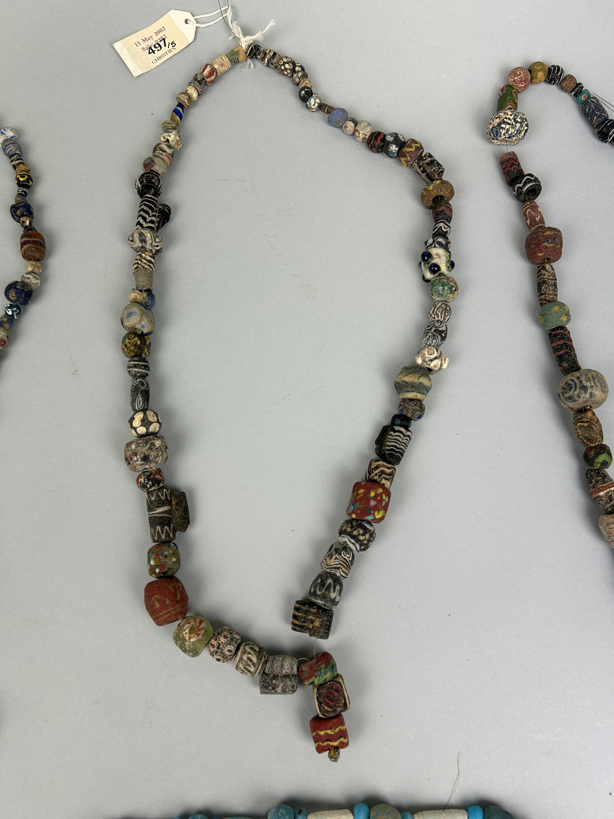 A GROUP OF FOUR POLYCHROME MOSAIC GLASS BEAD NECKLACES, HELLENISTIC TO ISLAMIC PERIOD CIRCA 4TH - Image 3 of 14