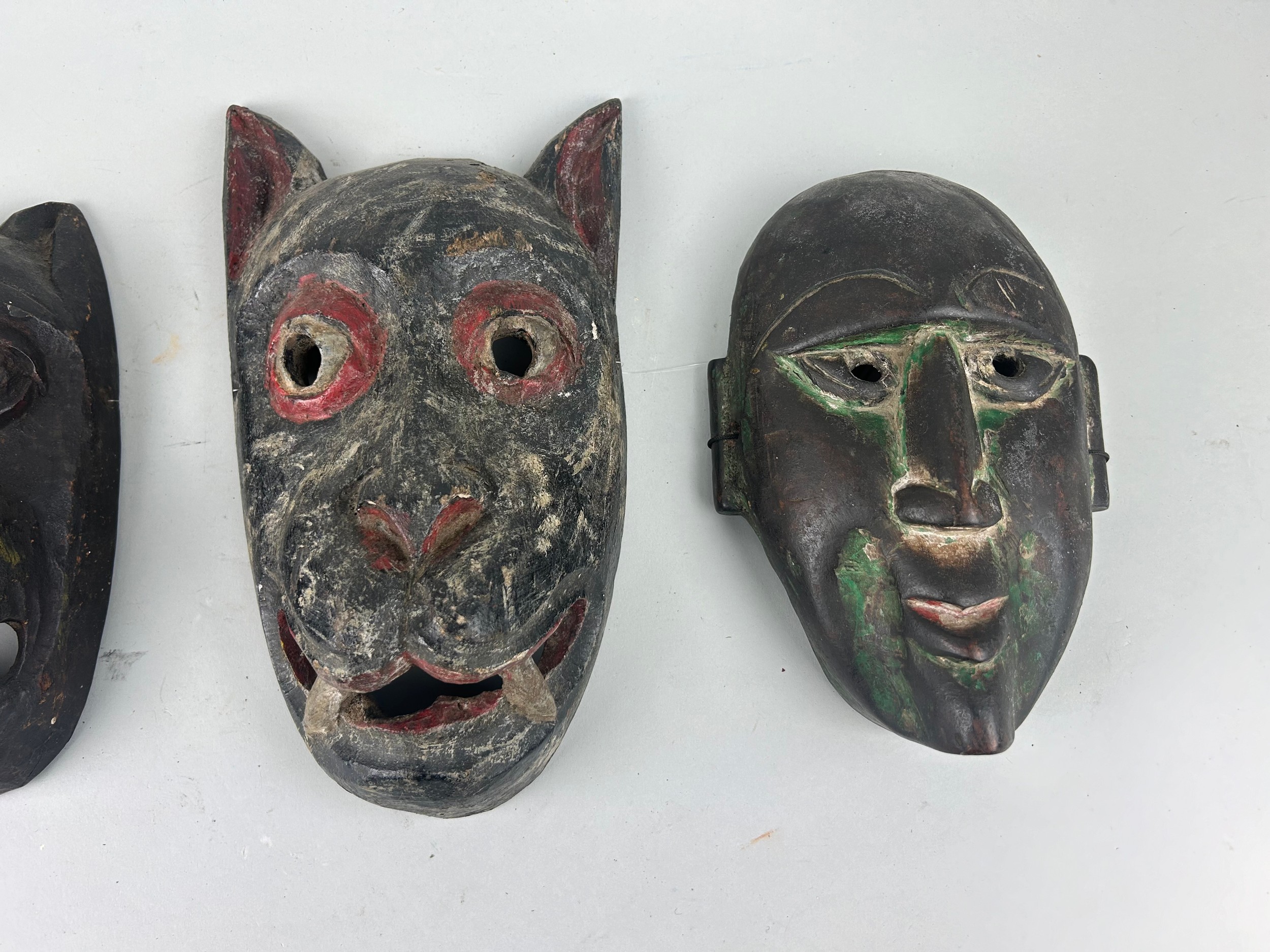 A GROUP OF FOUR AFRICAN TRIBAL MASKS (4), Largest 27cm x 14cm - Image 2 of 3