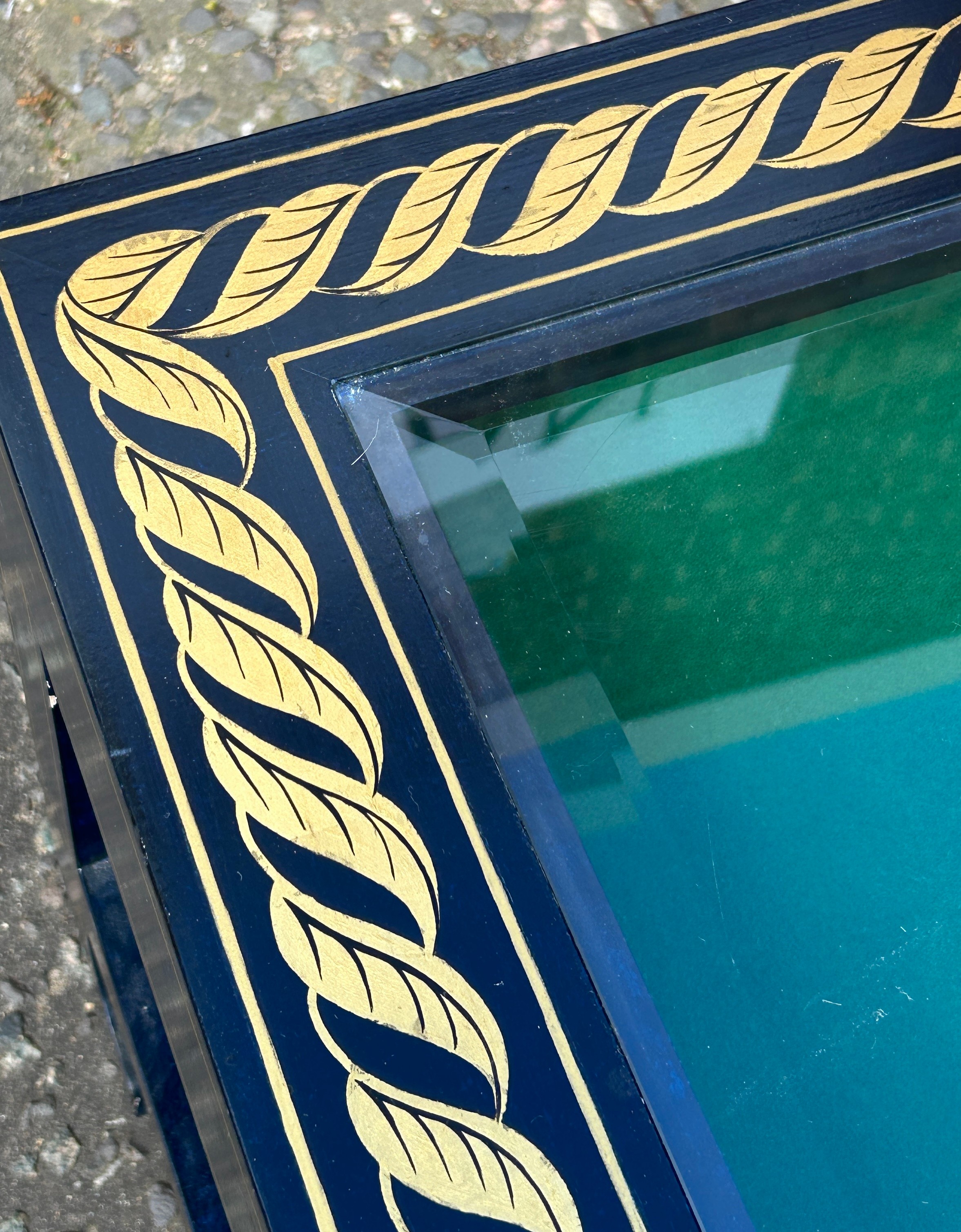 A DESIGNER COFFEE TABLE WITH GLASS INSERT AND GOLD GREEK KEY BORDER, 114cm x 53cm x 42cm - Image 3 of 4