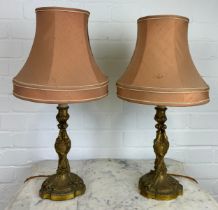 A PAIR OF FRENCH BRONZE CANDLESTICKS AS LAMPS, 27cm H each. With shades.