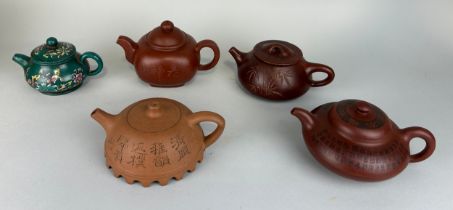 A COLLECTION OF CHINESE YIXING CLAY TEA POTS AND COVERS (5) All with seal marks to verso. Largest