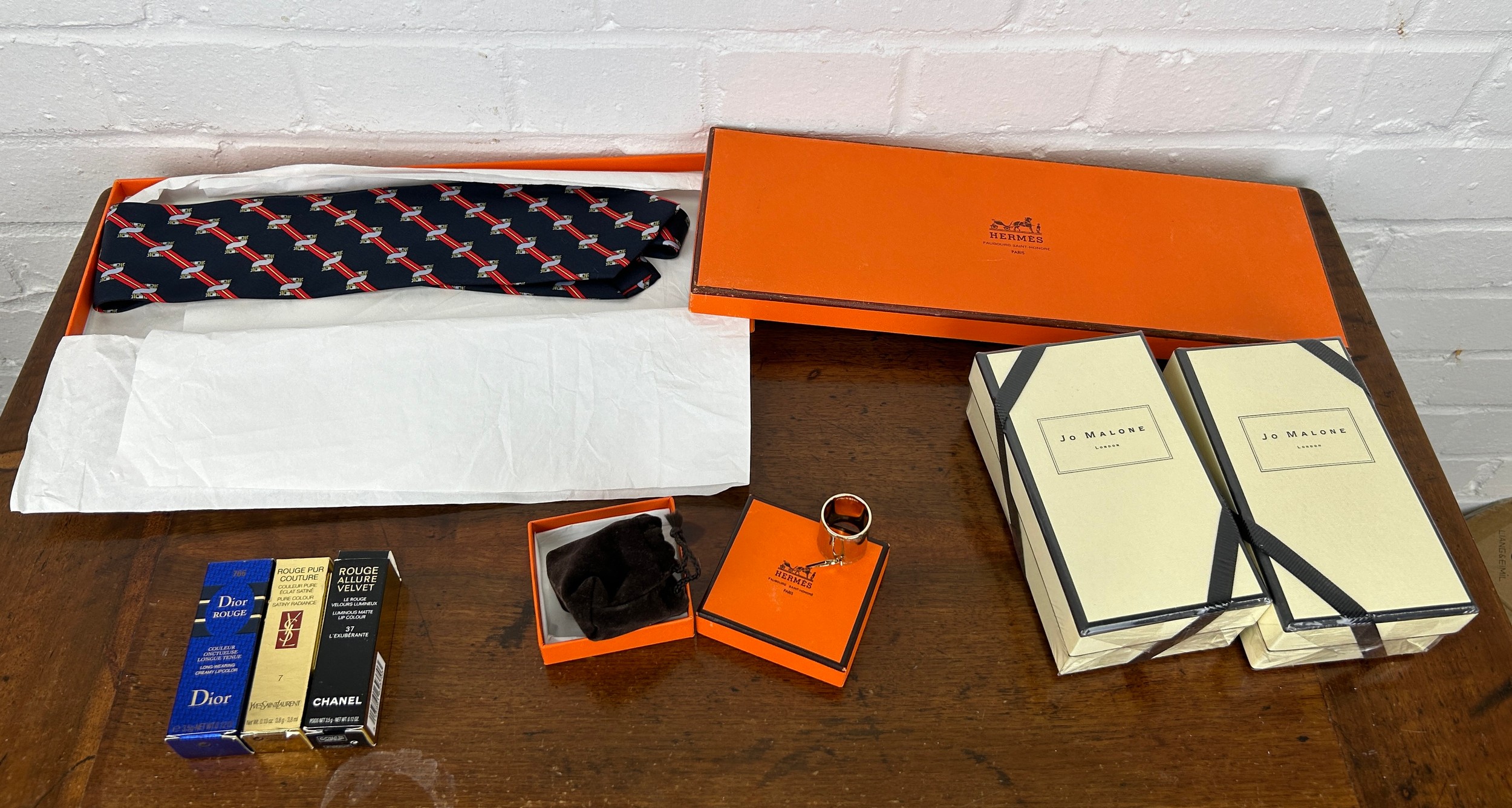AN HERMES GENTLEMANS TIE AND SCARF ALONG WITH A SCARF RING, JO MALONE COLOGNE, DIOR AND CHANEL ITEMS