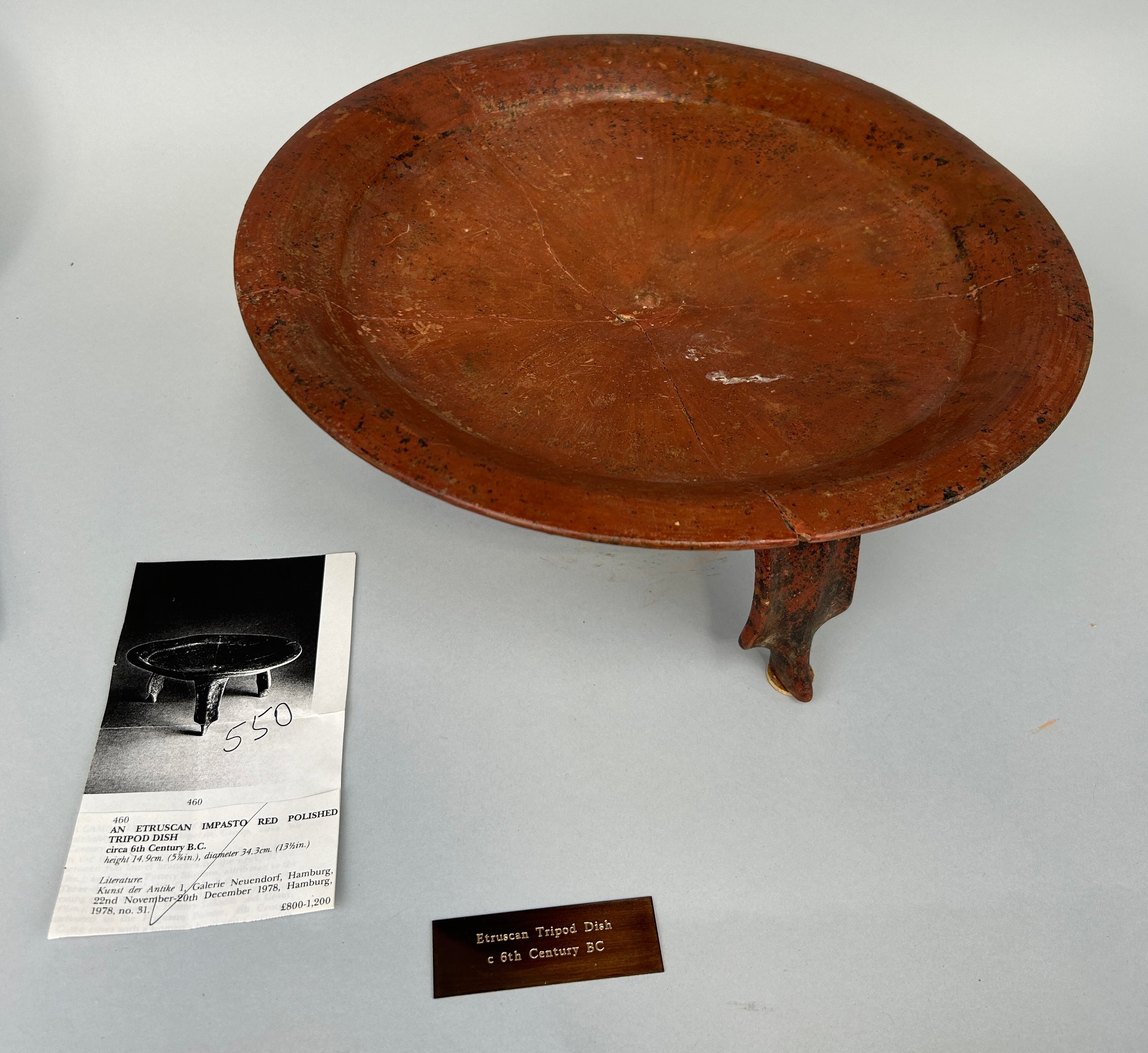 AN ETRUSCAN IMPASTO RED POLISHED TRIPOD DISH CIRCA 6TH CENTURY B.C. 34.3cm x 14.9cm Purchased at