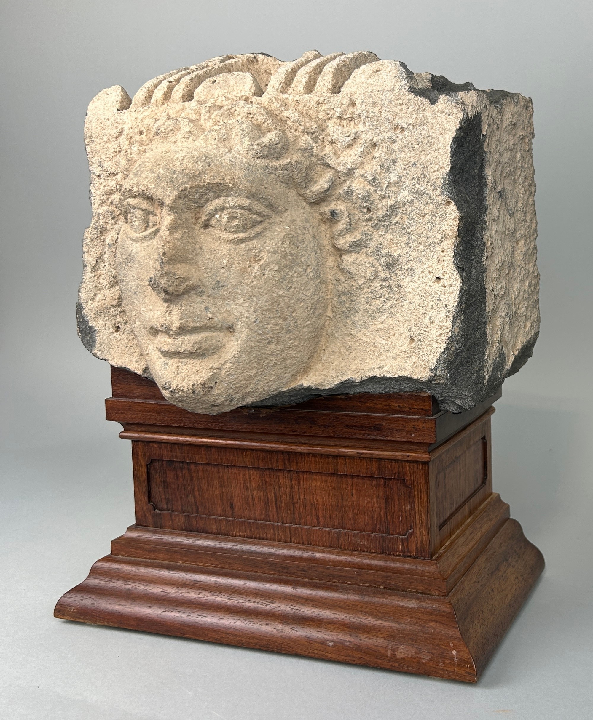 AN EAST ROMAN 'HAURAN' BASALT RELIEF FRAGMENT IN THE FORM OF A HUMAN HEAD CIRCA 2ND CENTURY A.D. The - Image 4 of 9